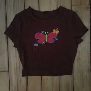 brown fitted t shirt with butterfly’s